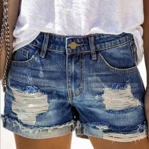 Distressed denim shorts. Size small. High rise